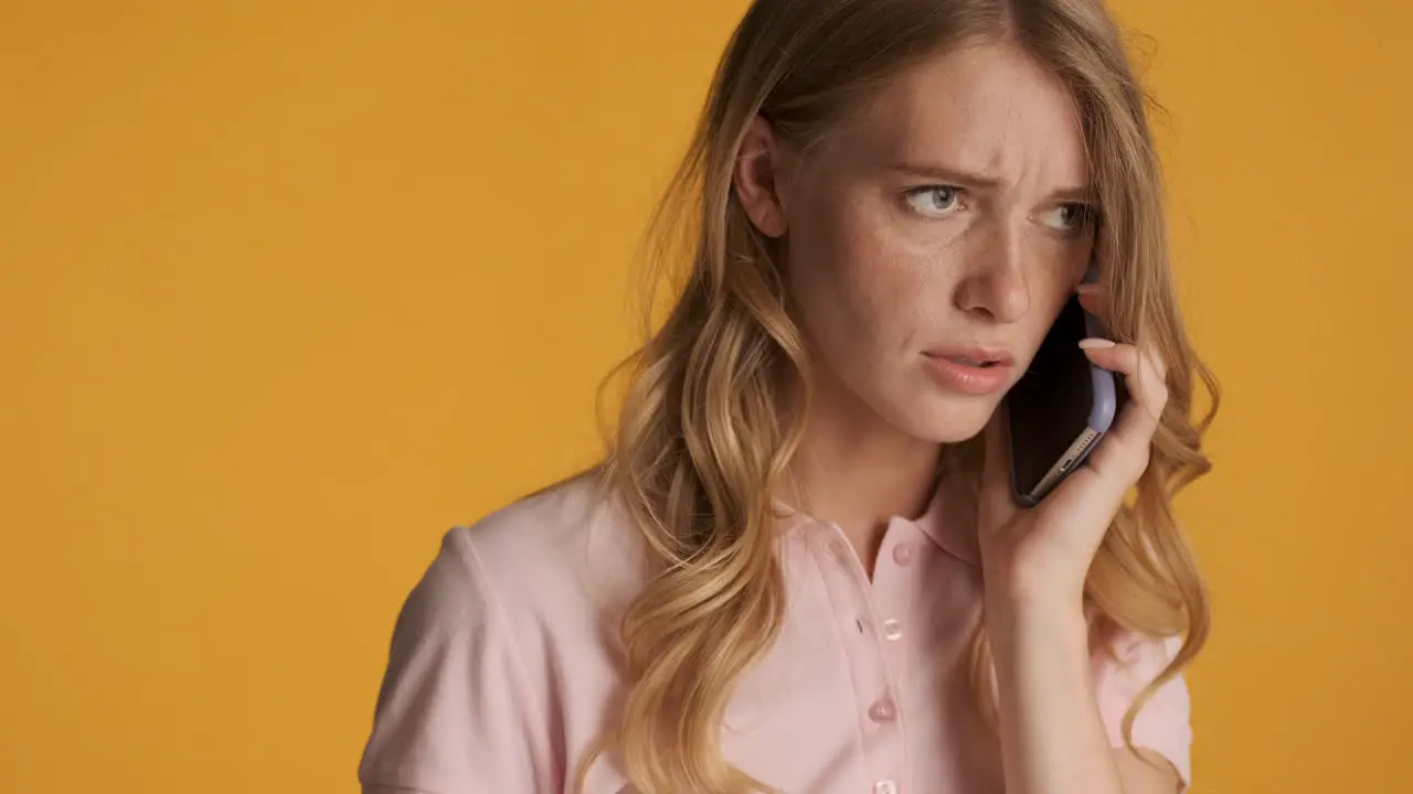 Caucasian woman having a call on smartphone