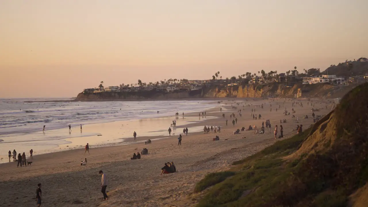 Pacific Beach California Sunset with a lot of foot traffic on the beach