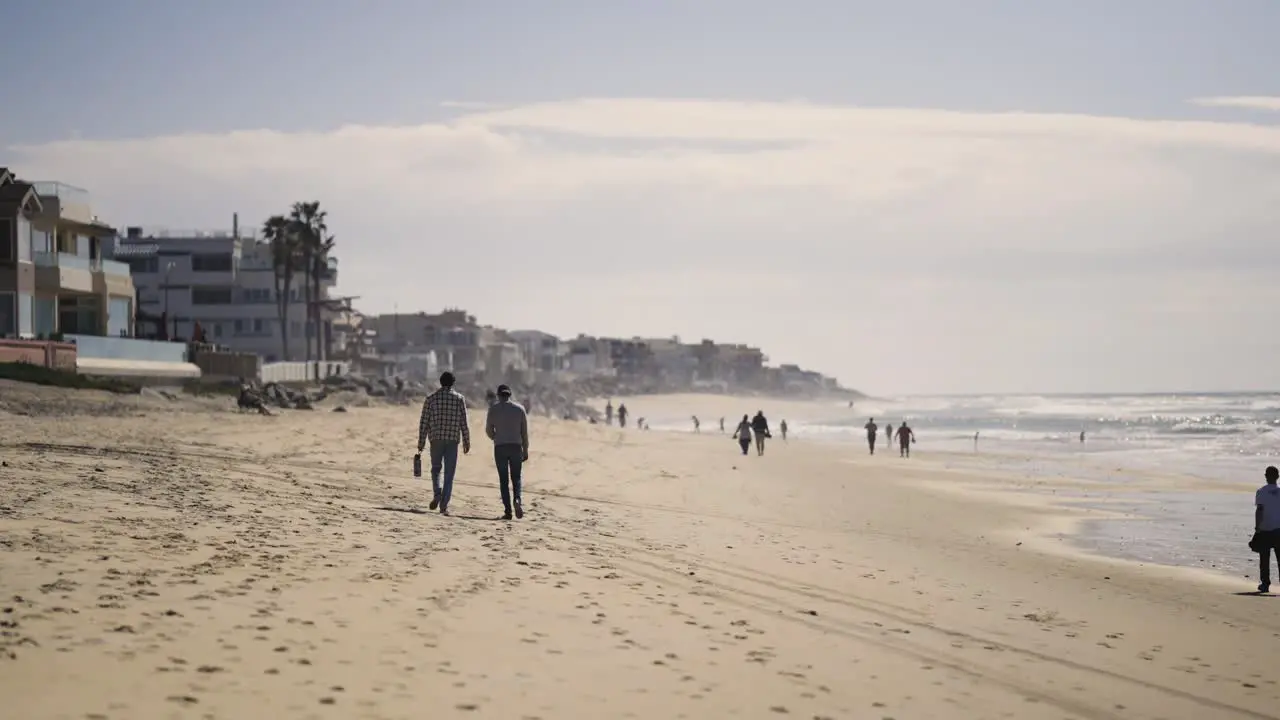 Pacific Beach California Sunset with People walking down the beach