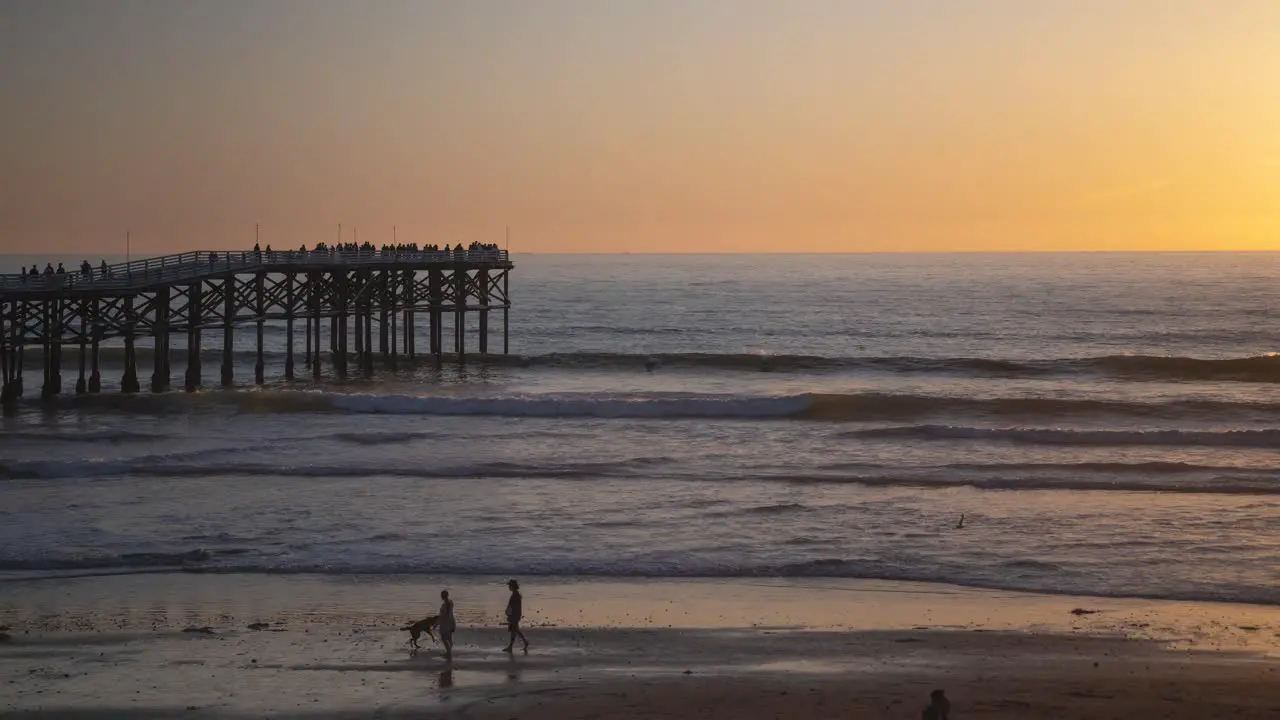 Pacific Beach California Pier Sunset with Waves Crashing on Beach Sunset Timelapse