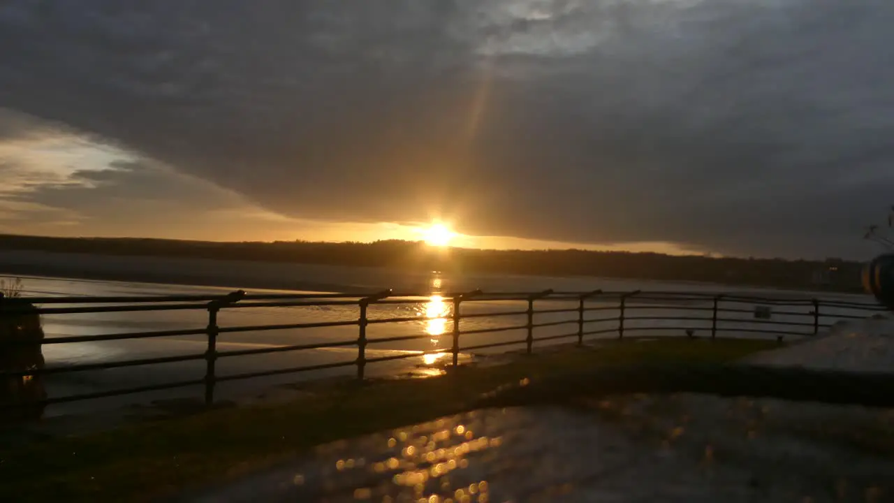 Sunrise waterfront British canal gates leading to river Mersey