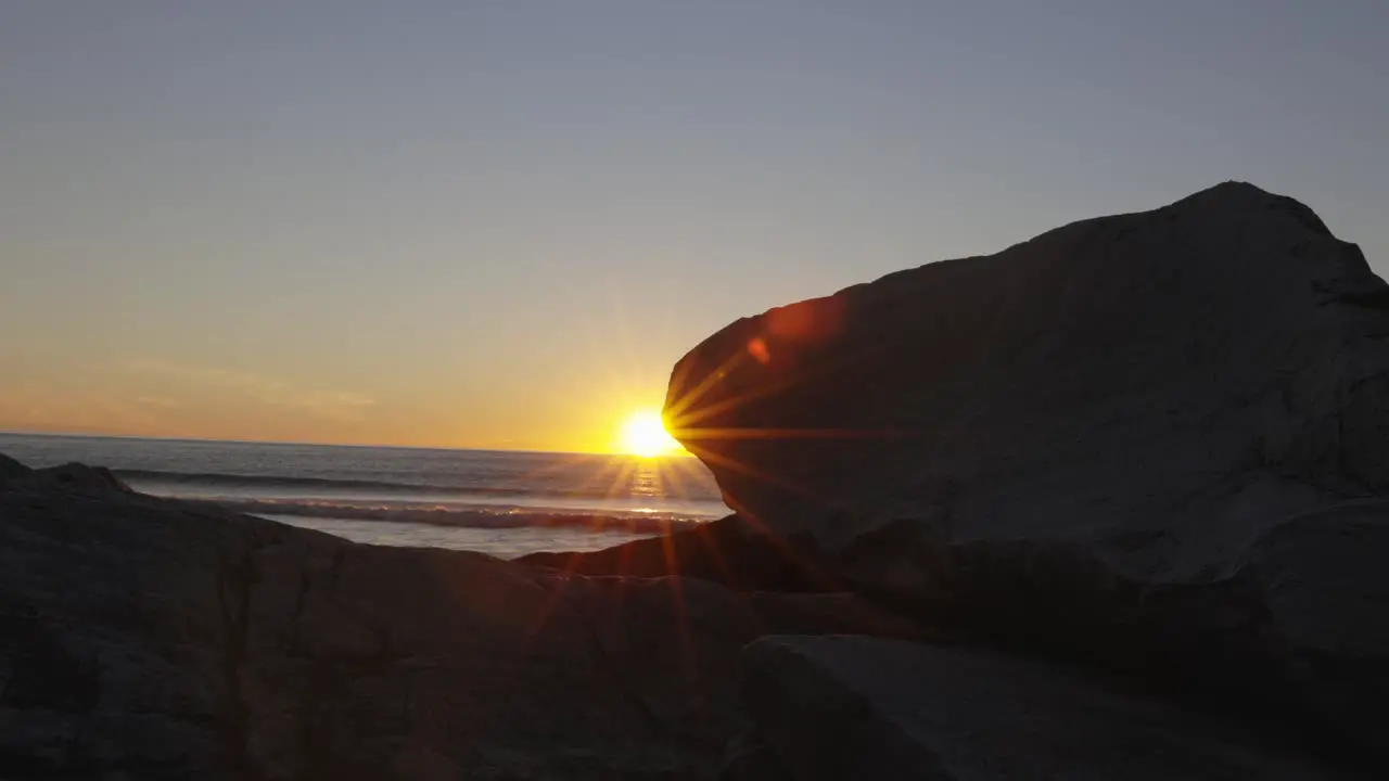 Astonishing Sunset Behing Rock At Kvalvika Beach Lofoten Norway