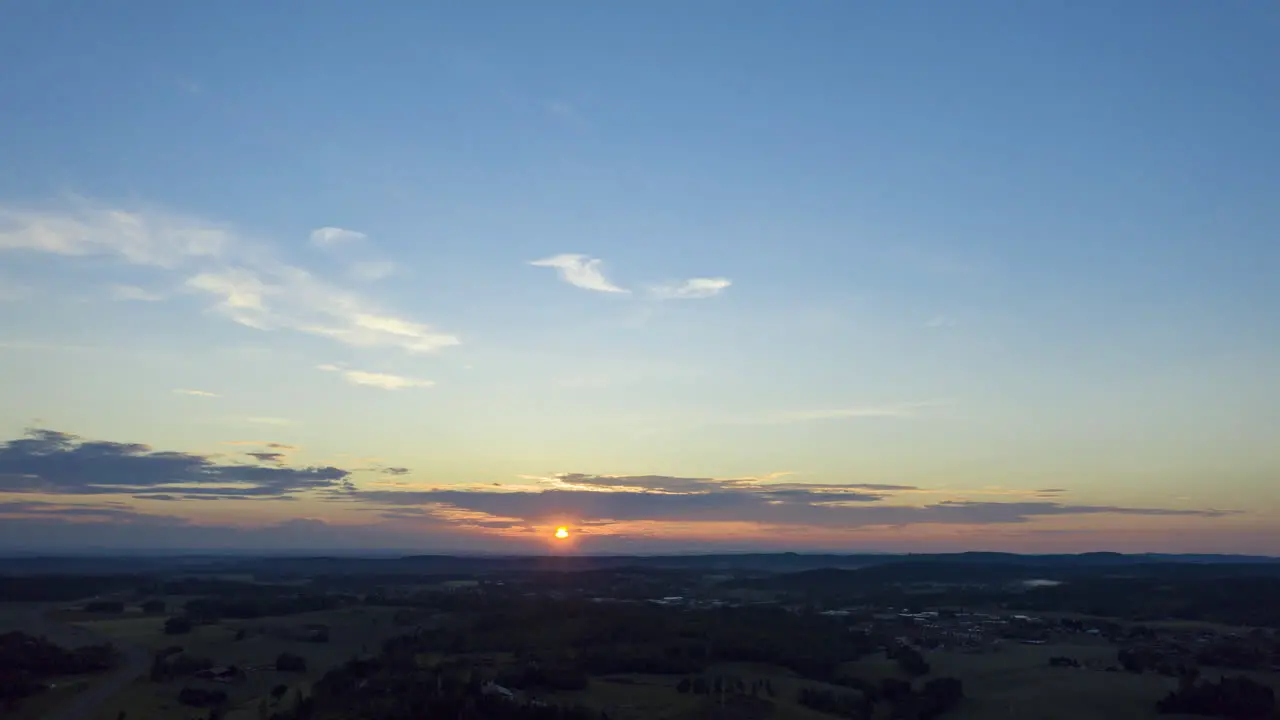 Panning hyperlapse of clouds moving over the countryside summer sunset in South Norway