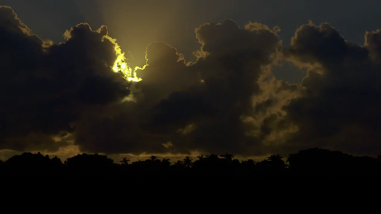 Morning Sun Beginning To Emerge From Behind Dark Clouds In South Florida U