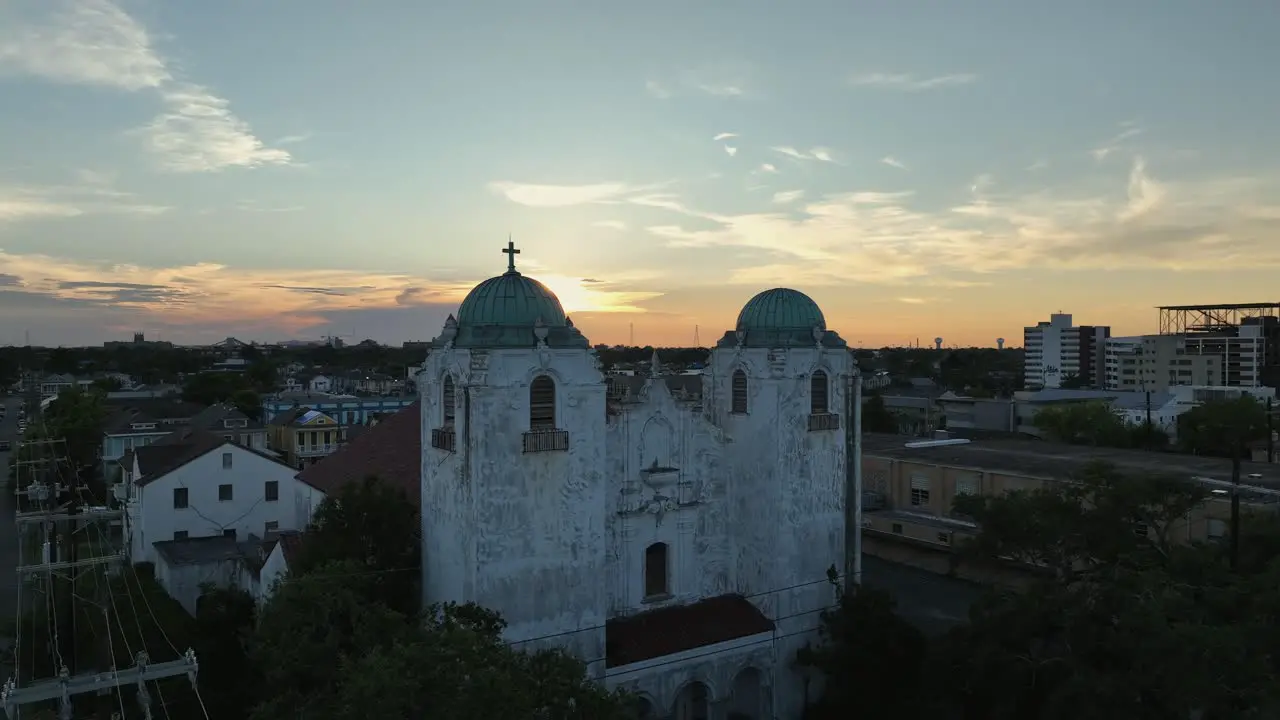 Aerial view of a closed church in New Orleans suburbs at sunset