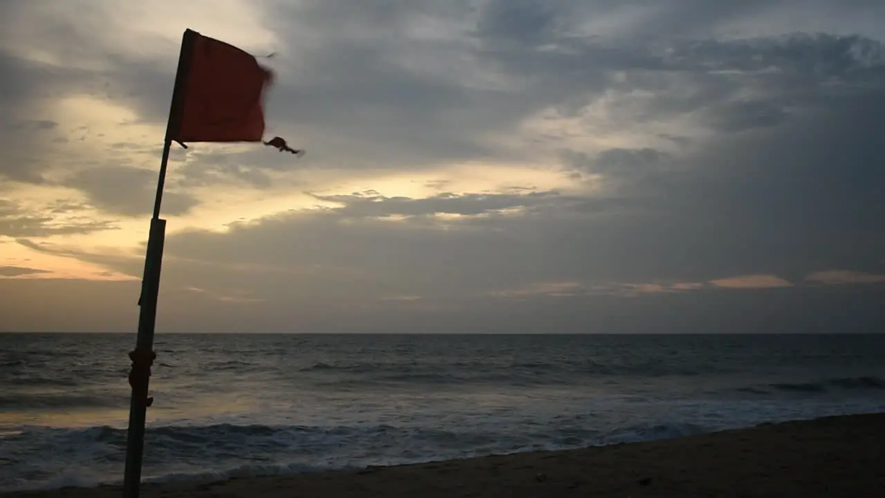 Red flag says don't swim at the beach Sri lanka