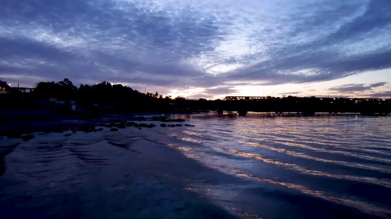 Shot of a bridge in a distance right after sunset at Sylvania