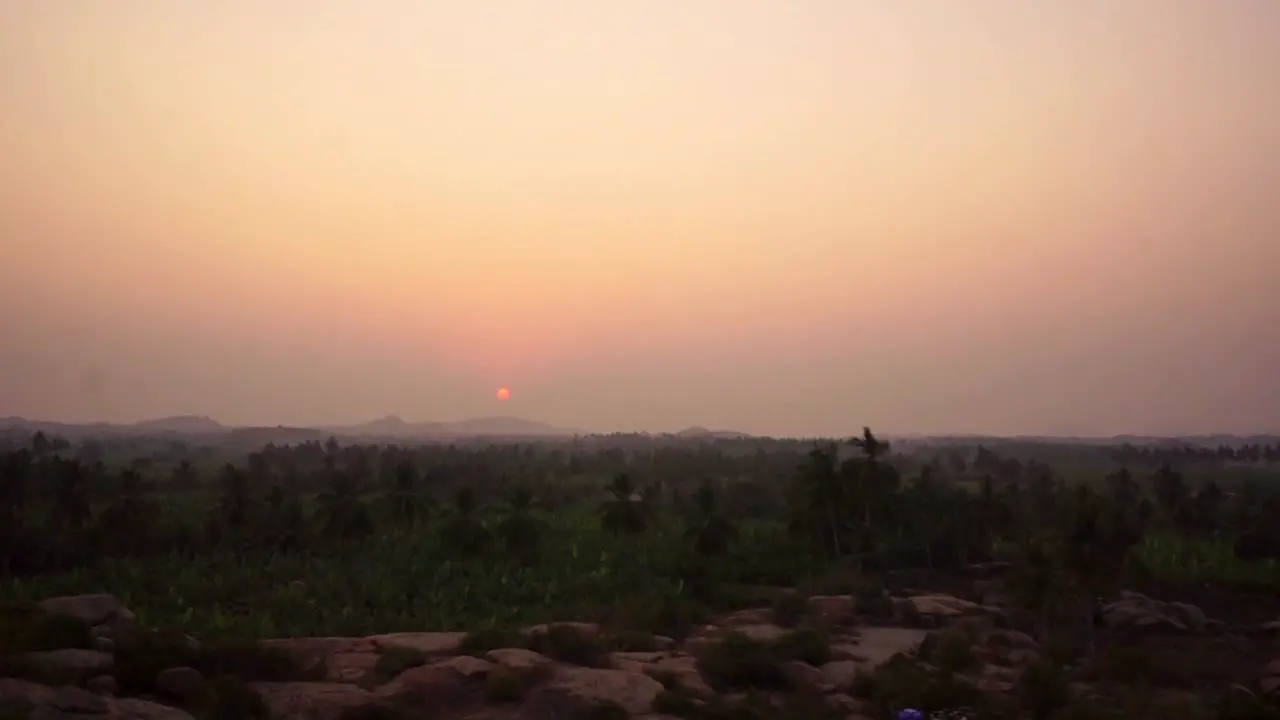 Sunset in Hampi India Over the banana trees