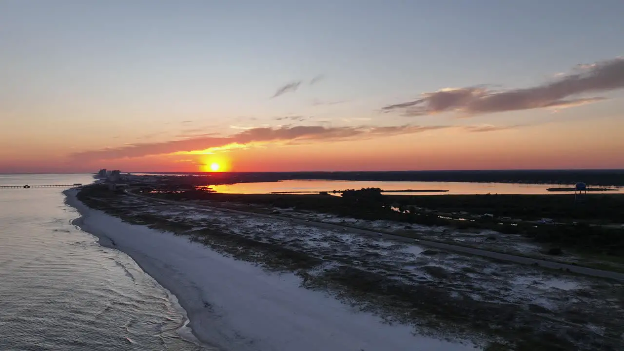 Reverse aerial view of sunset over Alabama