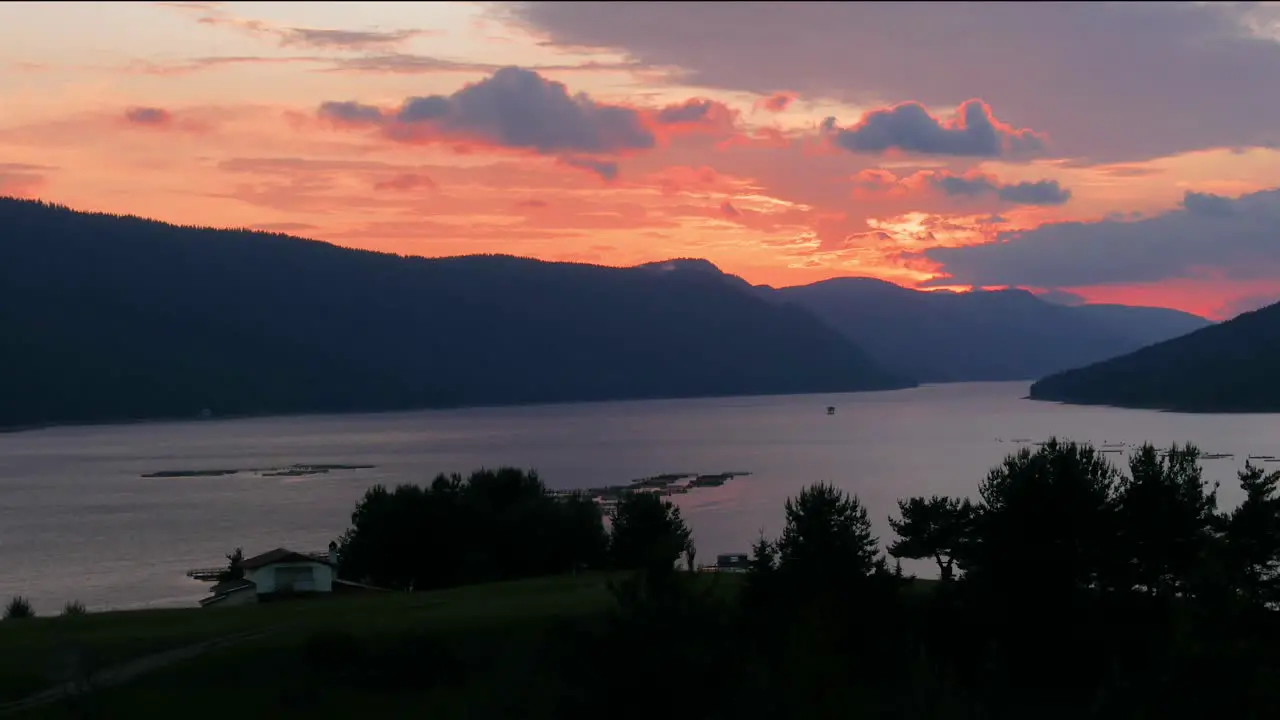 Time lapse sunset over a mountain lake