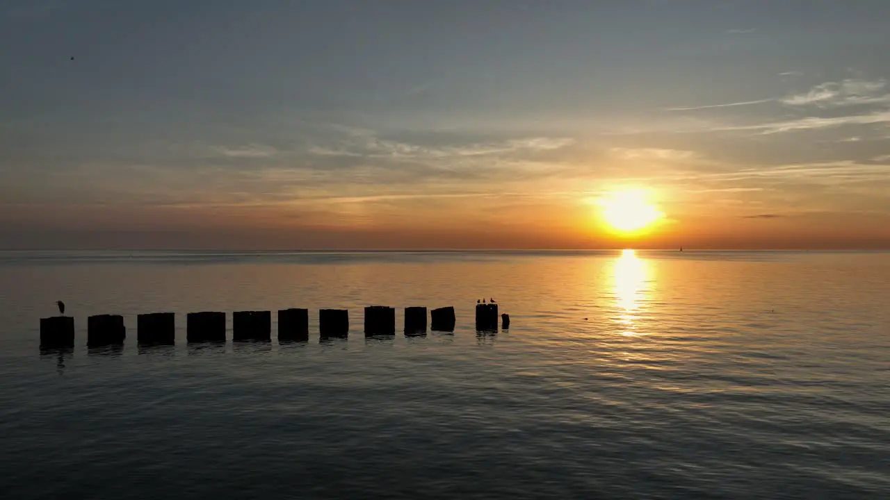 Sunsetting and smooth Mobile Bay at sunset