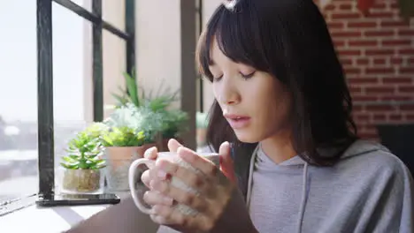 Thinking woman drinking coffee