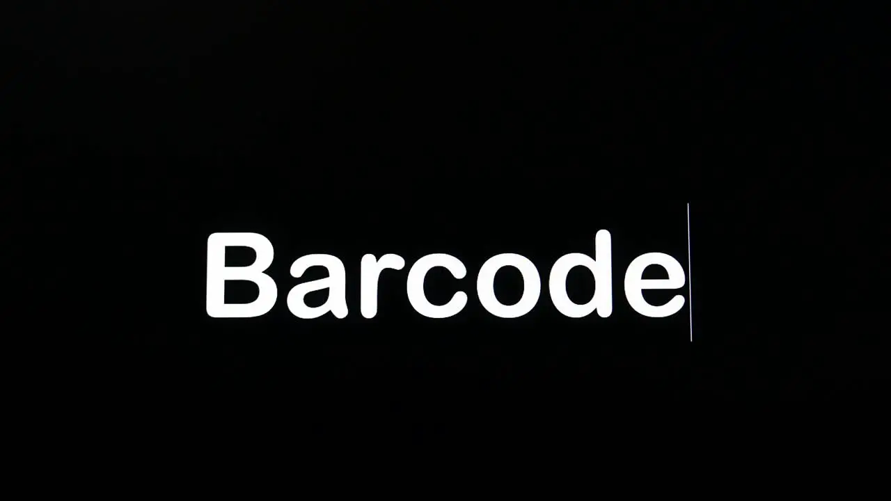 Typing on the screen with a flashing paragraph forming the word Barcode in white on a black background