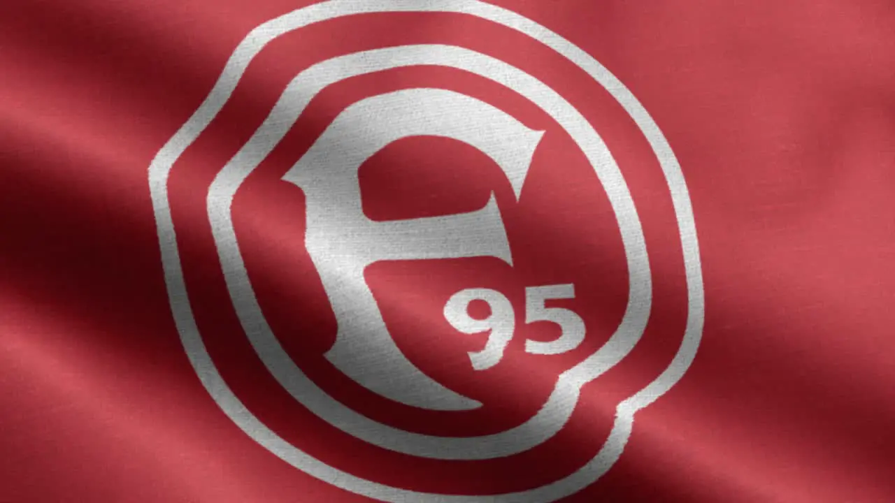 Red 4k closeup animated loop of a waving flag of the Bundesliga soccer team Fortuna Dusseldorf