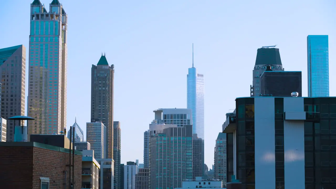 Handheld shot looking at numerous high rise buildings in downtown Chicago Illinois