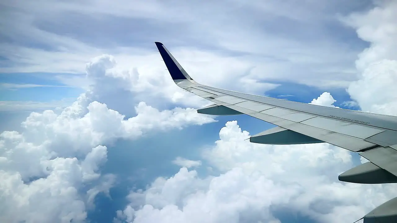 view of beautiful cloudy sky from commercial airplane windows