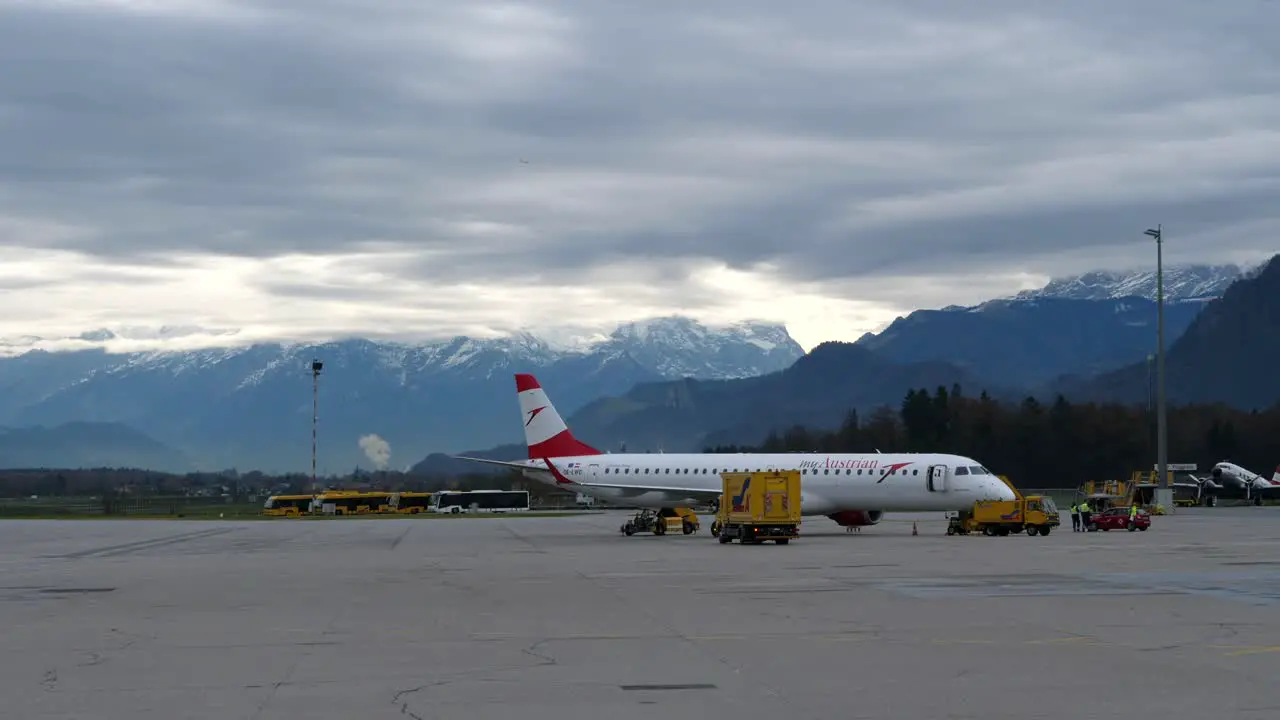 An Austrian Airlines airplane parked at Salzburg airport