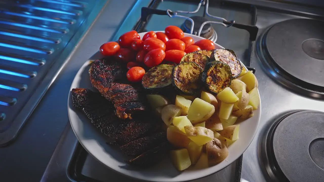 Cooked Honey Soy Chicken In A Plate With Fresh Ripe Tomatoes Fried Eggplant Slices And Potatoes