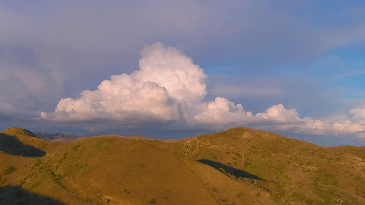 Beautiful Aerial Over Southern California Foothills With Large Storm Thunderheads Clouds Looming