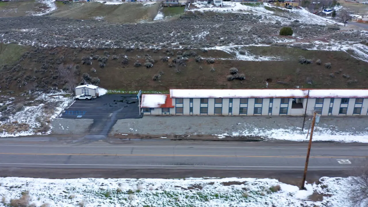 A view of an old wintery snowy motel in Tehachapi CA