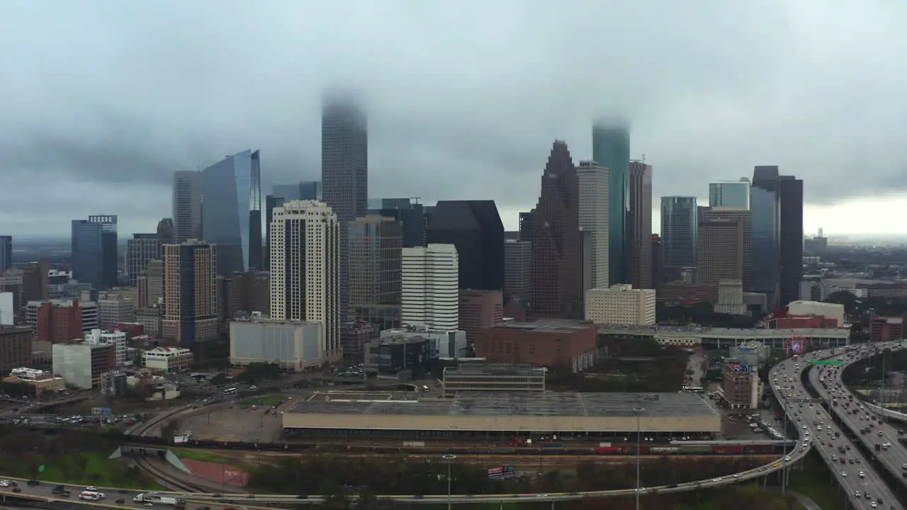 This video is about an aerial of downtown Houston on a rainy and cloudy day