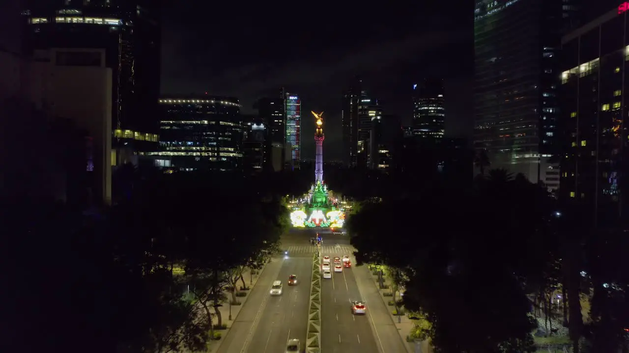 Aerial view of the Reforma avenue and the Angel of Independence illuminated in Mexican flag colors on national night in Mexico city