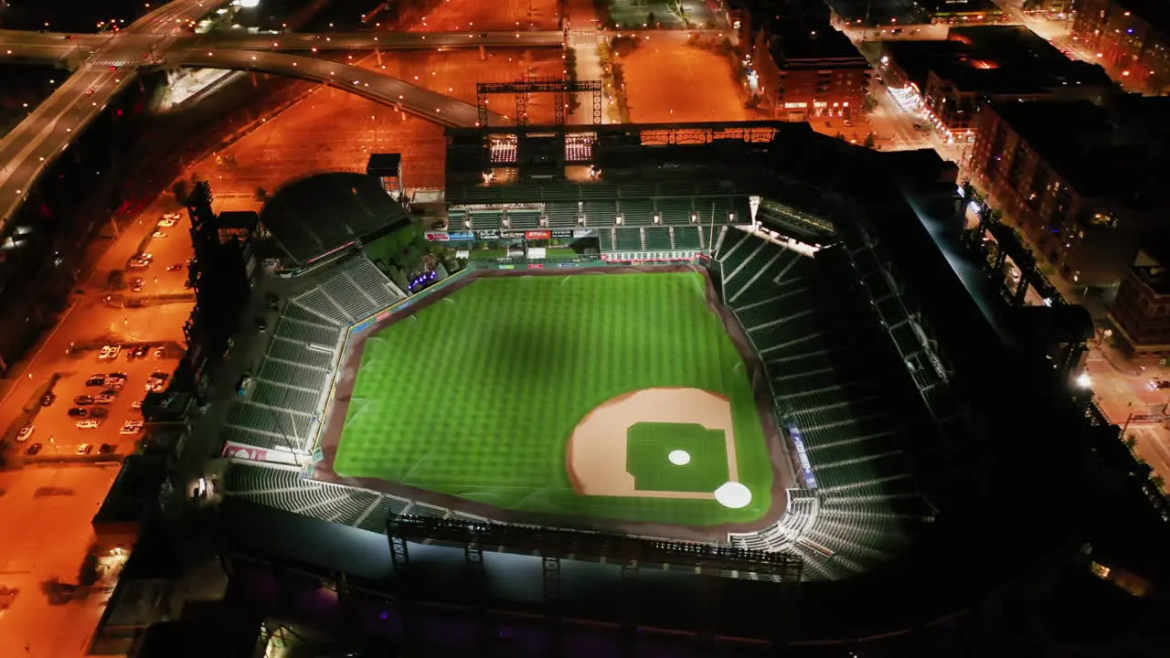 Aerial view around the illuminated Coors Field stadium night in Denver Colorado