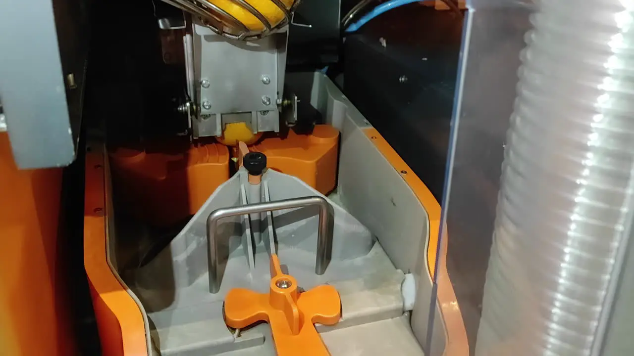 Automatic Orange Juice maker machine working on squeeze out oranges for juice