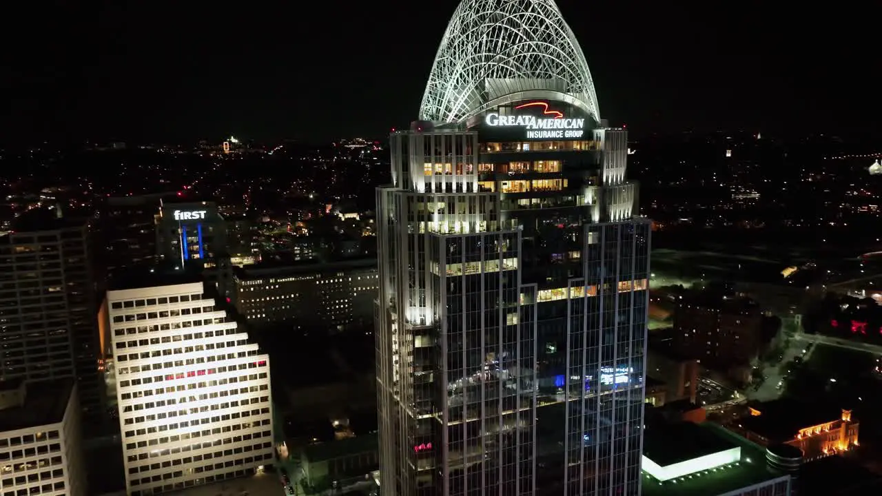 Aerial view around the Great American Tower with night lights in Cincinnati USA