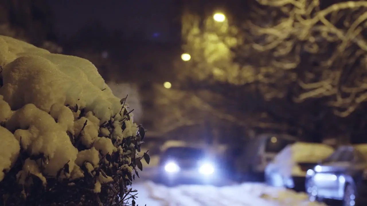 Car headlights approaching in dark winter evening criminal getaway