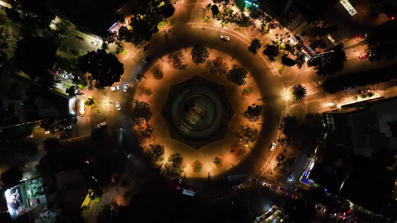 Aerial view descending above the Fuente de Cibeles Plaza night in Mexico city