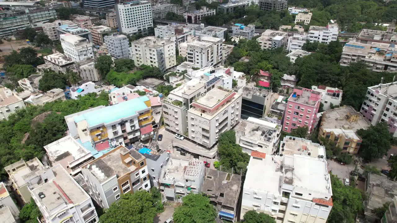 Afternoon 4K Aerial video of Hill top colony and Banjara Hills is an urban residential and commercial centre and one of the most affluent neighbourhoods in Hyderabad Telangana India