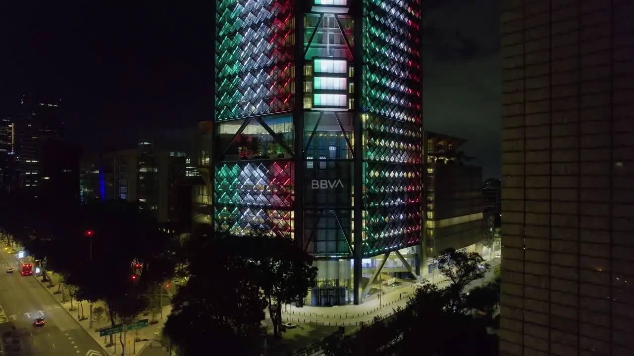 Aerial view in front of BBVA tower illuminated in the colors of the Mexican flag Independence day in Mexico city