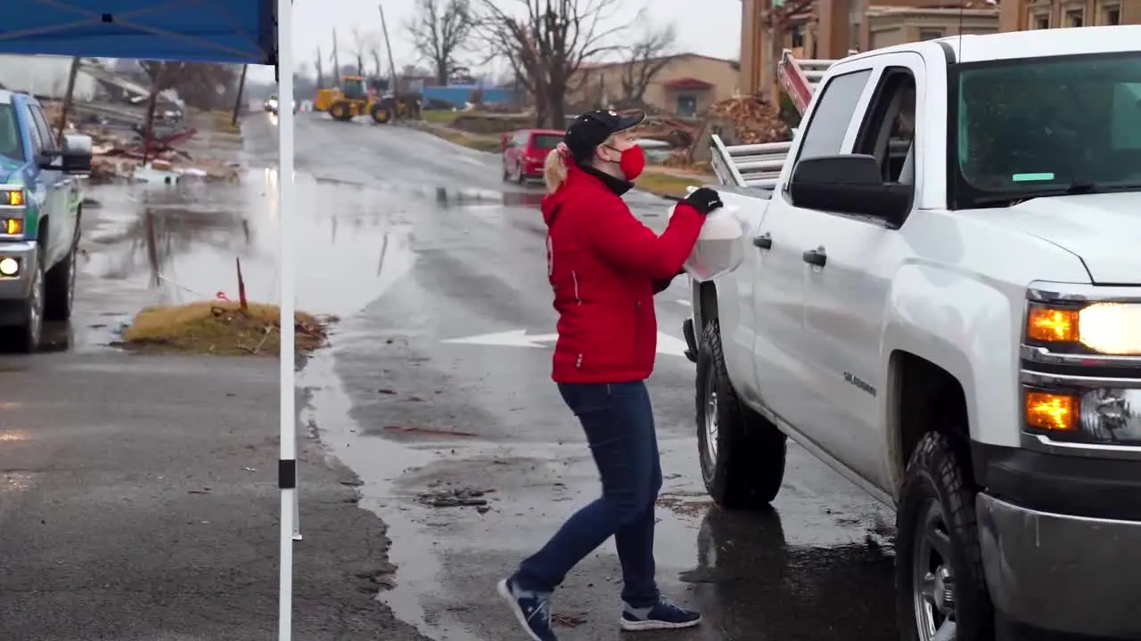 Fema Agents Man Kentucky Tornado Sites Including The Town Of Mayfield Destroyed By The Storm Handing Out Food And Relief Supplies