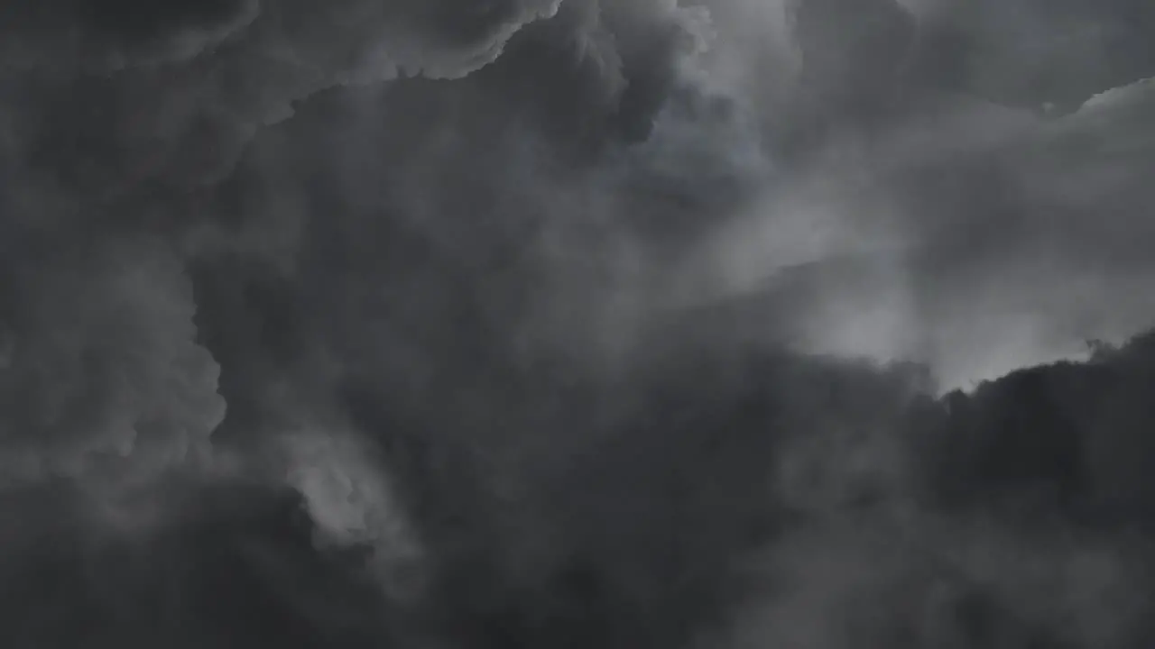 dark storm clouds in the sky and striking lightning bolts