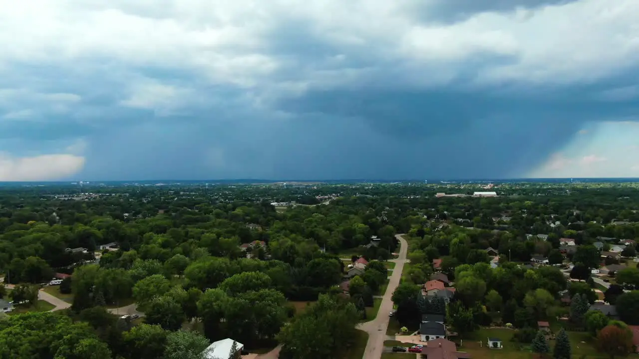 aerial moving toward the downpour of rainfall over Appleton Wisconsin