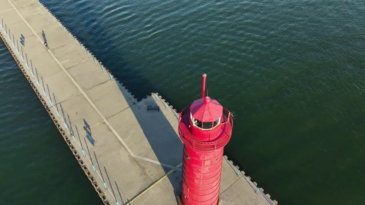 View of the lighthouse and channel pier in Autumn