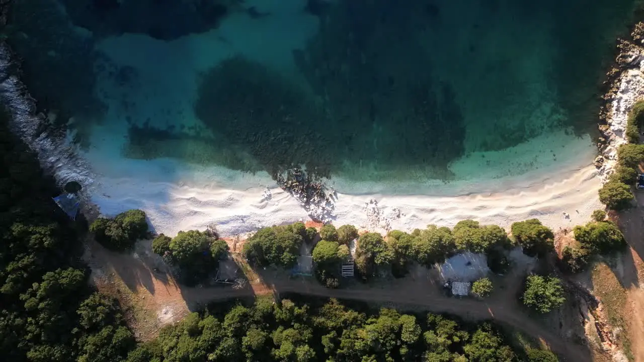 epic topdown drone shot waves at Sunset