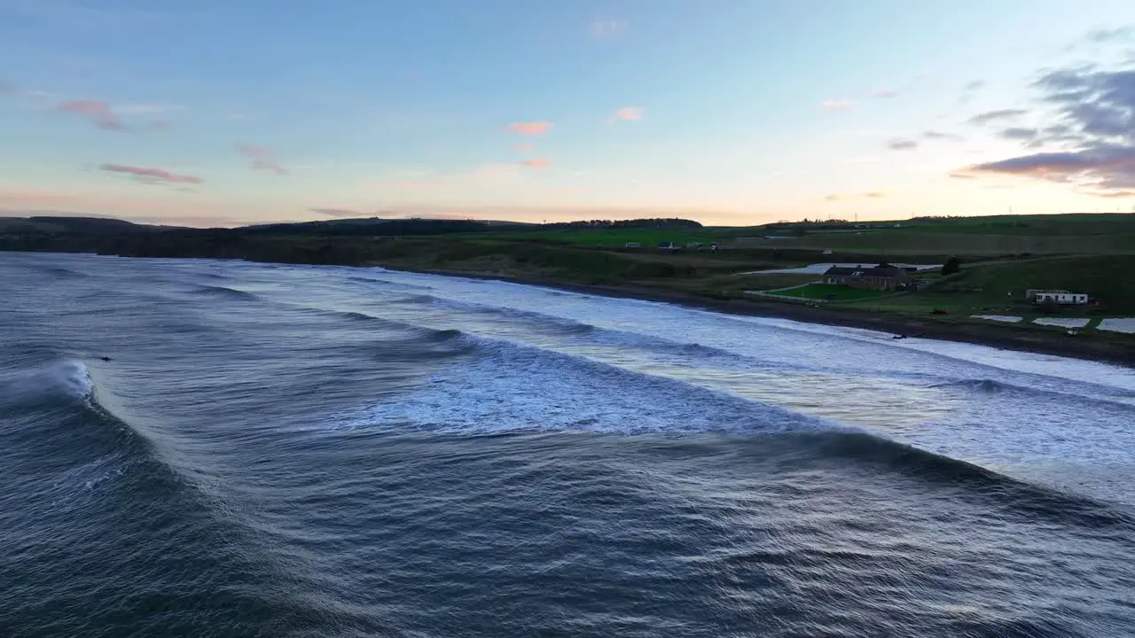 United Kingdom's Surf at Sundown The Scottish Beach of Thorntonloch Dunbar's Coastal Beauty Scotland United Kingdom