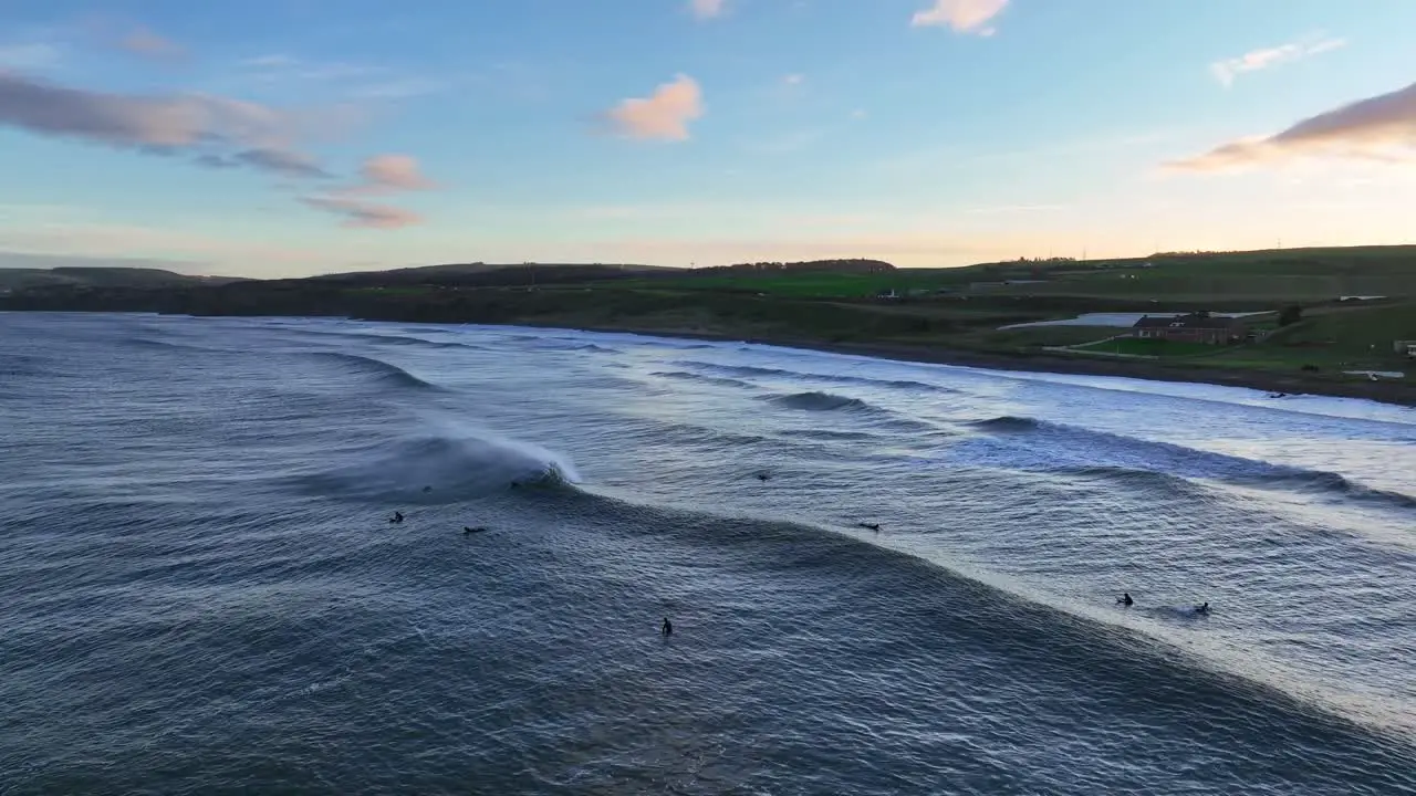 Dunbar's Sunset Surfing Session The Scottish Beach Experience at Thorntonloch on the North Sea Scotland UK