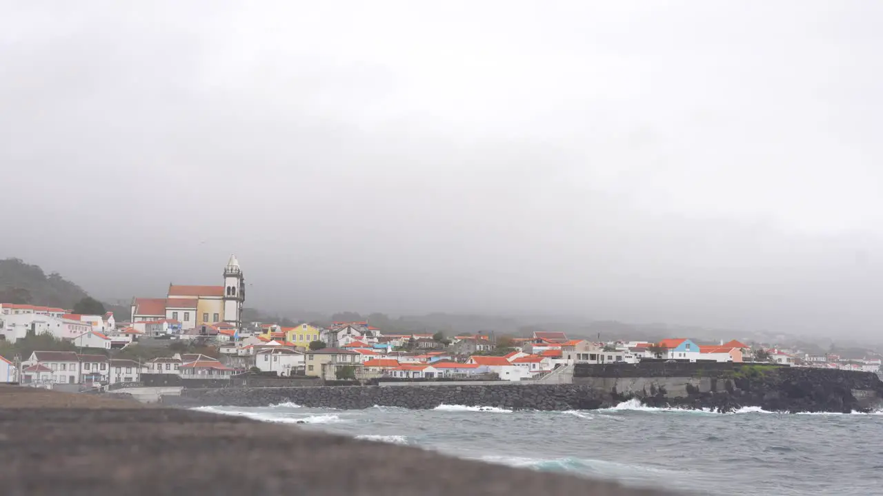 Foggy Sao Mateus da Calheta with crashing waves along the Atlantic coast in Terceira Azores