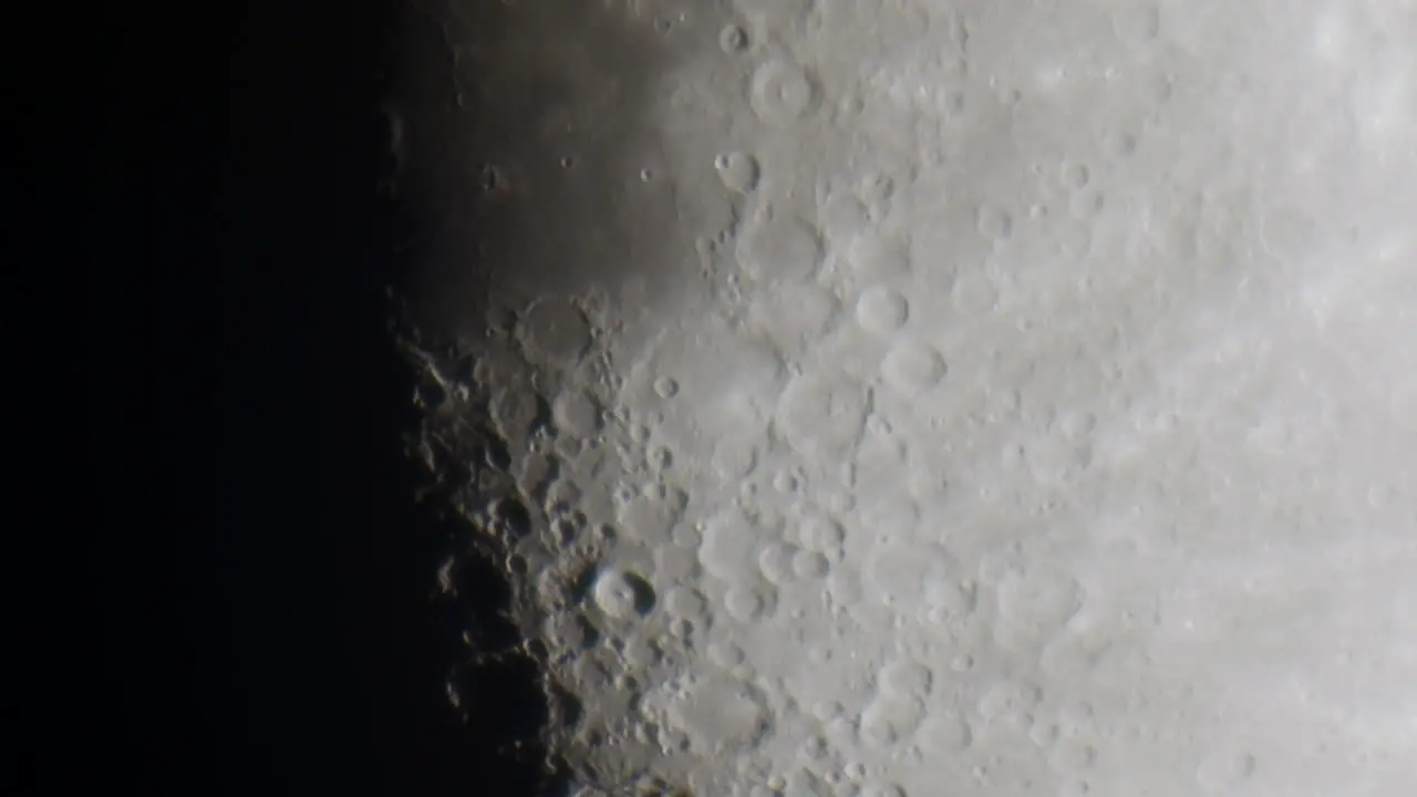 Extreme close up of the moon slowly moving