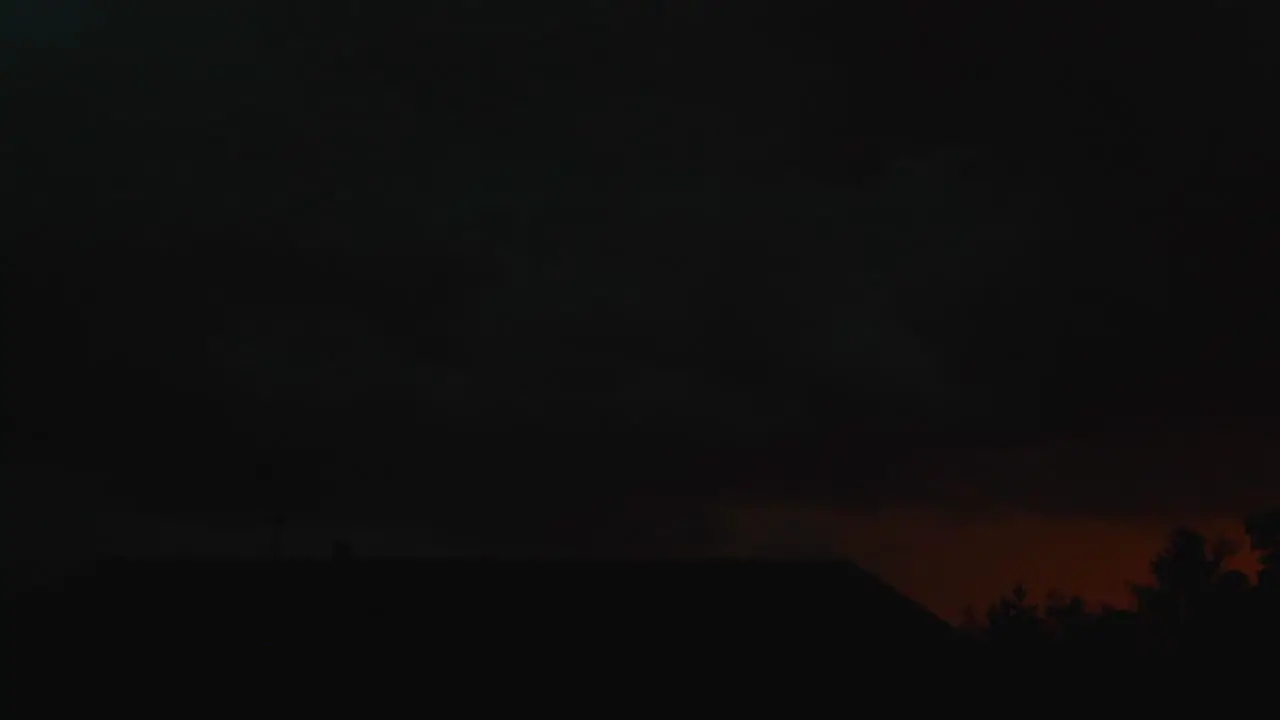 Time Lapse video capture during heavy storm with view one apartment house and many trees captured in the Czech Republic during late and night time used 24 fps and speed up to the fast time-lapse