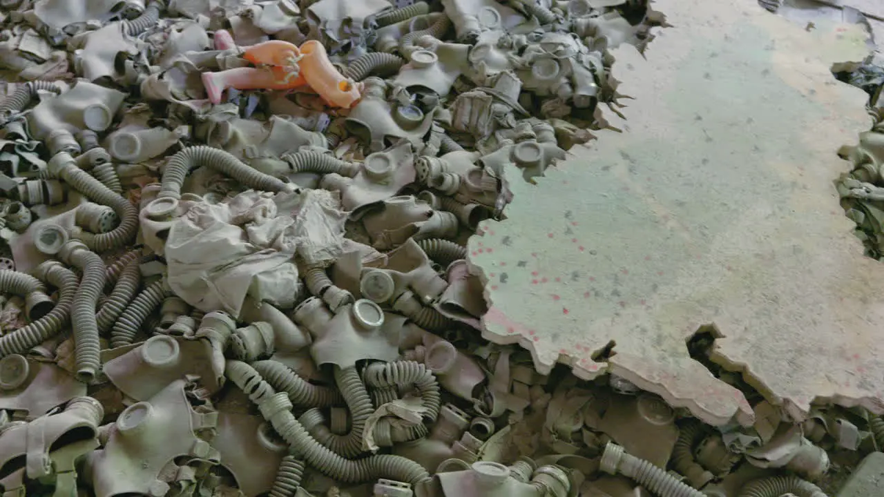 Piles of old abandoned gas masks in Pripyat remains after the Chernobyl disaster