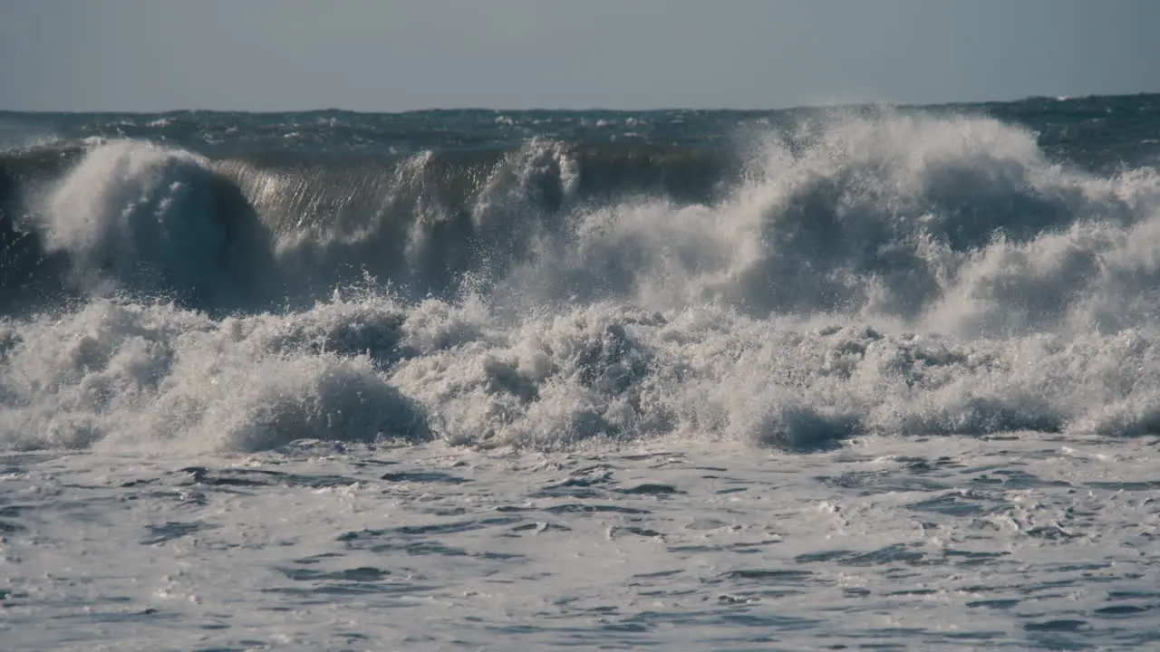 Slow motion large waves crashing in Half Moon Bay California