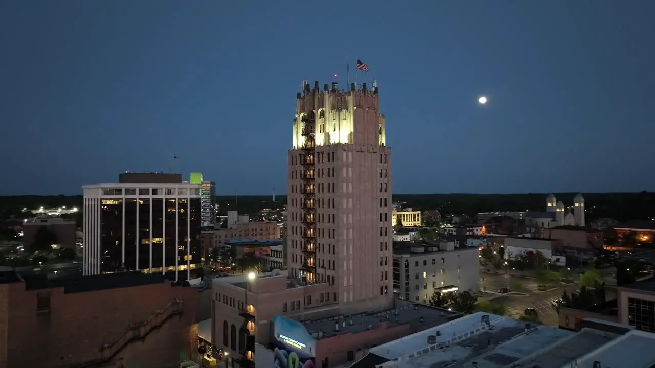 Jackson Michigan downtown at night with drone video close up circle