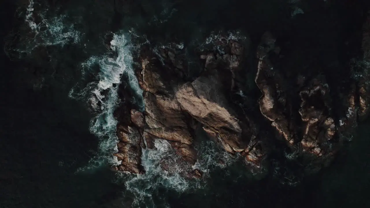 Waves Splashing On Sea Rocks In Mazunte Mexico aerial top down