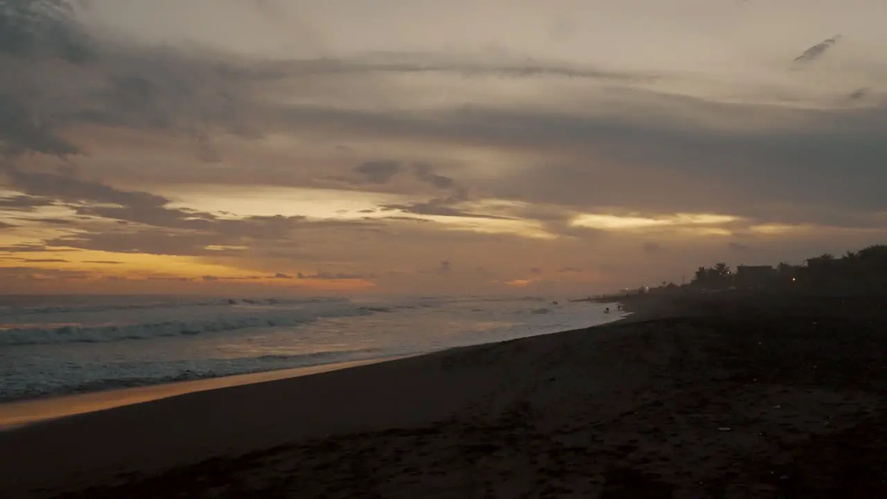 Tilt-down On Sunset Seascape Of El Paredon Surfing Beach In The Province Of Escuintla Guatemala