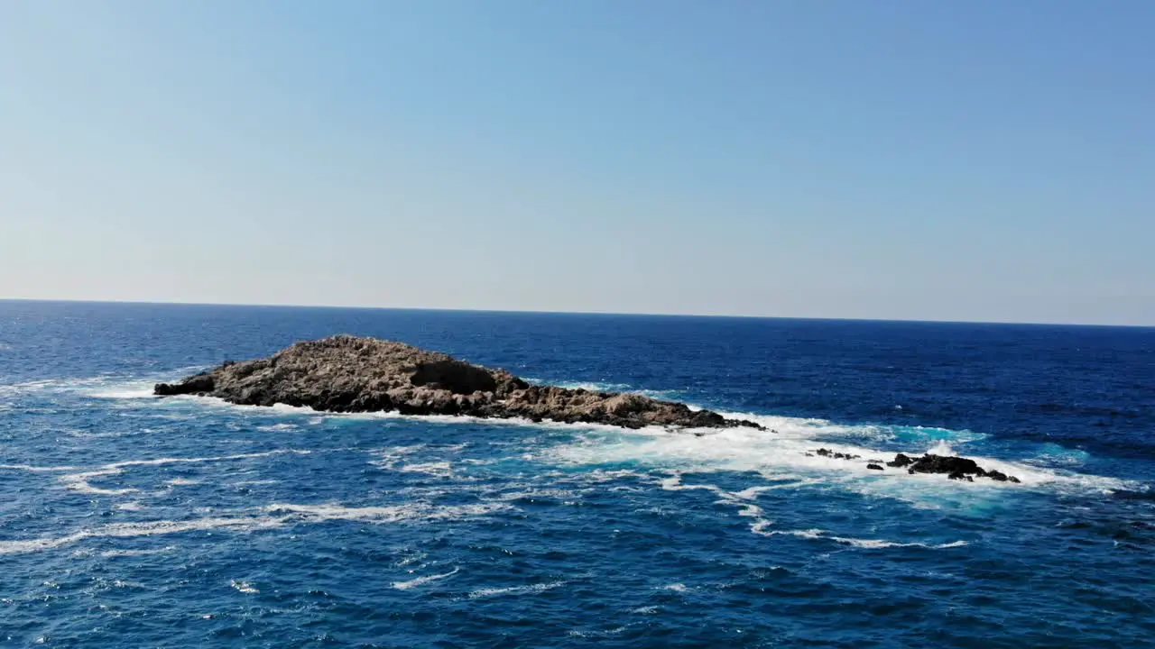 Ocean Waves Splashing On The Rocks At Jerusalem Beach Erisos Greece aerial drone slow motion shot