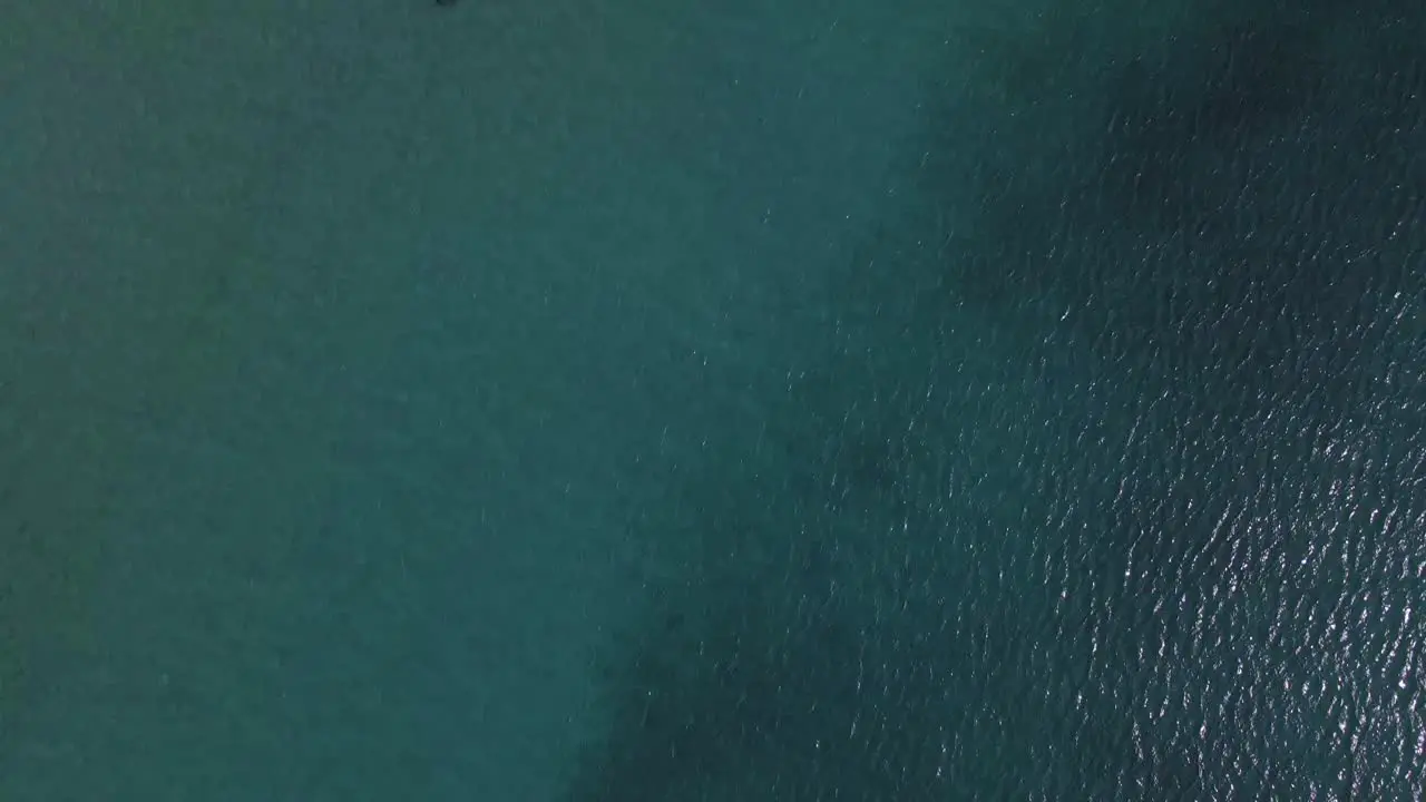 4K overhead moving forward clip over a shipwreck in the tropical beach of Epanomi Norhtern Greece